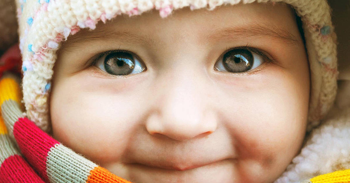 baby in scarf and hat