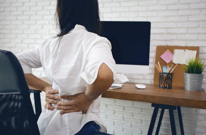 woman with bad posture at a computer