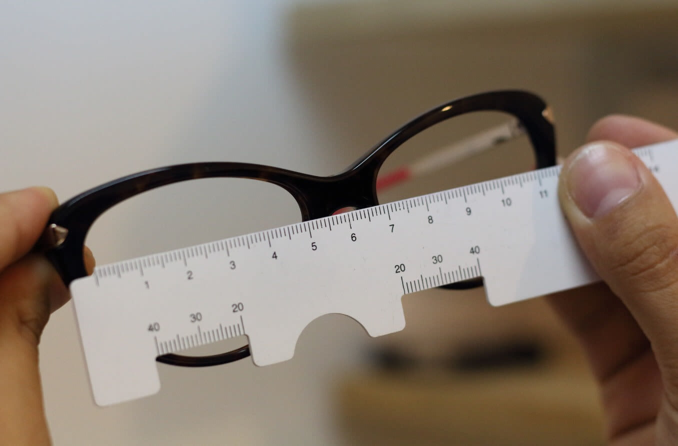 Woman getting fitted for eyeglasses