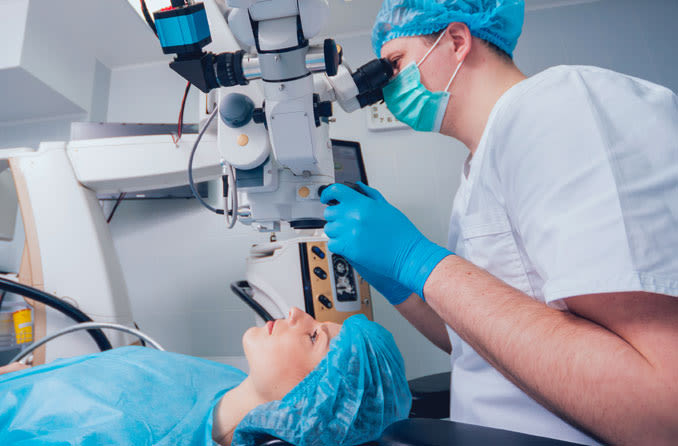 doctor performing laser cataract surgery on patient